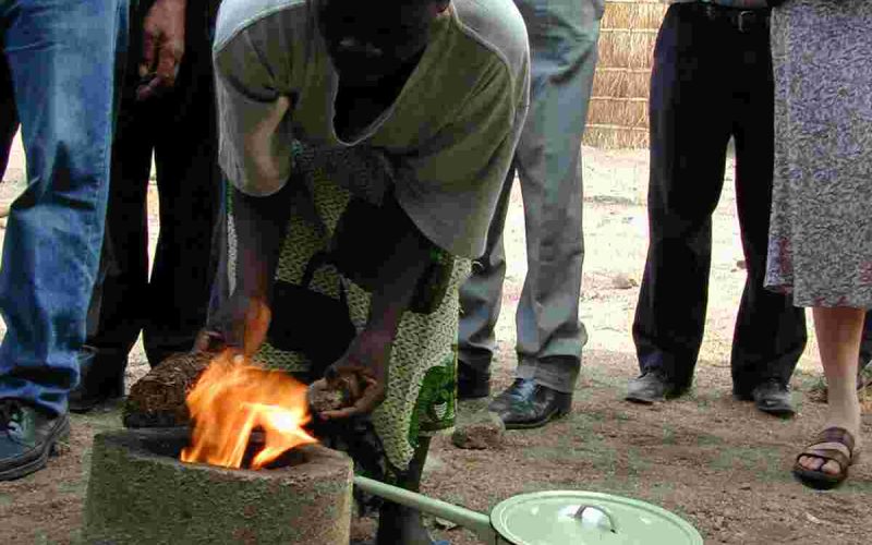 38 burning briquette on portable stove